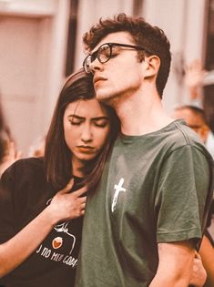 a man and woman standing next to each other