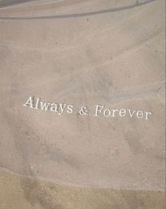 the words always and forever are etched in sand