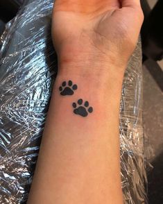 a small paw print on the wrist