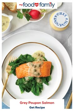 the cover of grey poupon salmon get recipe cookbook is shown on a plate