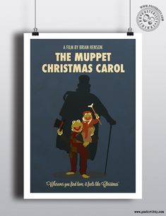 the muppet christmas carol poster is hanging on a wall next to a white clock