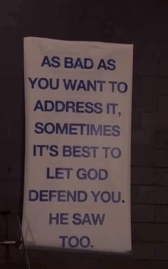 a sign hanging on the side of a building that says as bad as you want to address it, sometimes it's best to let god defend you he saw too