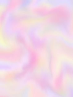 a blurry image of pastel colors in pink, yellow and blue with white highlights