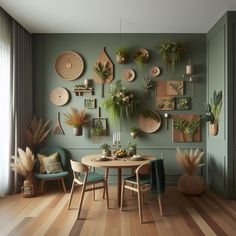 a dining room with green walls and wooden flooring, potted plants on the wall