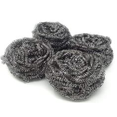 three black scrubcloths are stacked on top of each other in the shape of spirals