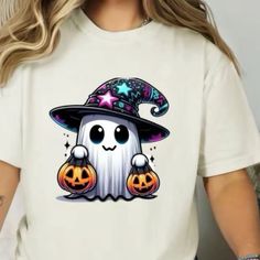 a woman wearing a white t - shirt with a ghost on it