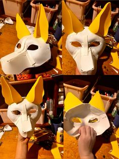 the mask is white and has yellow horns