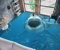 a shark swimming in the middle of a living room with blue flooring and walls