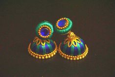 *****The price mentioned is for a pair of jhumkas***** Well designed and ornated silk thread jhumkas that come in various colors, color combinations, patterns and designs. I can try and make the designs to your liking if you specify a specific color or design pattern. As I can make these Silk Thread, Color Combinations, Wellness Design, Pattern Design, I Can, Thread, Drop Earrings, Silk