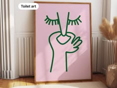 a pink wall with a green hand drawn on it