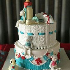 a white cake with blue and red decorations