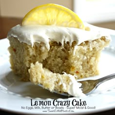 a slice of lemon cake on a plate with a fork