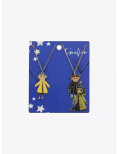 two necklaces with cartoon characters hanging from it's sides on a blue background