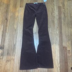 These Pants Are A Super Soft Velvet/Corduroy Material In A Chocolate Brown Color. Super Cute For Any Occasion Size 24 Low Rise Flare New With Tags Never Worn. There Is A Zipper On The Side To Tighten Them Shown In The Pictures. Brown Velvet Pants, Low Rise Flare Pants, High Waisted Baggy Jeans, White Flared Jeans, Pacsun Pants, Flower Pants, Flare Yoga Pants, Chocolate Brown Color, Corduroy Material