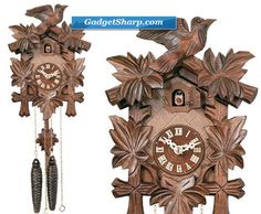 a wooden cuckoo clock with two birds on it