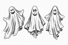 three halloween ghostes with faces drawn in ink on white paper, one is black and the other is white