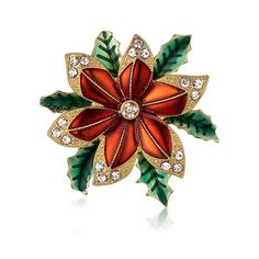 a red and green flower brooch with crystal stones on the center, surrounded by leaves