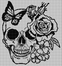 a cross stitch skull with roses and butterflies on its head, in black and white