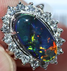 Beautiful Black Opal And Diamond Ring. Opal And Diamond Ring, Black Opal Ring, Opal Ring Gold, Oval Rings, Custom Earrings, Platinum Ring, Opal Auctions, Black Opal, Opal Rings