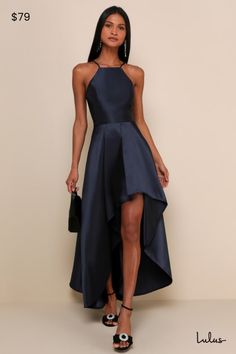 Raise a glass in the Broadway Show Navy Blue High-Low Gown! Medium-weight woven taffeta, with a high shine sheen, shapes this showstopping gown with adjustable spaghetti straps, an apron neckline, and a princess-seamed bodice. Fitted, banded waist sits atop a flowy, high-low maxi skirt with box pleats, side seam pockets, and a voluminous silhouette. Hidden back zipper/clasp. Fit: This garment fits true to size. Length: Floor length. Size medium measures 34.5" from top to bottom. Bust: Great for Fall Formal Dresses, High Low Maxi Skirt, Black Tie Wedding Guest, Lace Dress Classy, Eden Dress, High Low Gown, Sweet As Honey, Broadway Show, High Low Maxi Dress