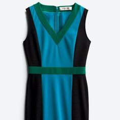 The Diane Von Furstenberg Sleeveless Colorblock Dress Is A Stunning Blend Of Style And Comfort, Perfect For The Modern Woman On The Go. Crafted From Stretchy Material, It Offers A Flattering Fit That Moves With You, Ensuring Ease And Comfort Whether You're Traveling Or Attending Events. The Vibrant Turquoise Green Is Beautifully Contrasted With Sleek Black, Creating A Chic And Sophisticated Look. The V-Neck Design Adds A Touch Of Femininity, While The Hem That Hits Below The Knees Strikes The Ideal Balance Between Elegance And Practicality. This Dress Is Versatile Enough To Transition From Daytime Adventures To Evening Gatherings, Making It A Staple For Those Who Appreciate Both Fashion An Turquoise Green, Size 12 Dress, Colorblock Dress, Von Furstenberg, Diane Von, Diane Von Furstenberg, Neck Designs, Stretchy Material, Modern Woman