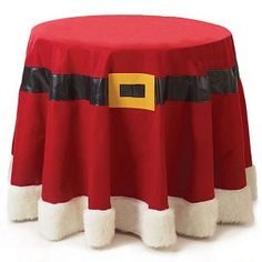 a santa claus table cloth on top of a round table