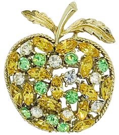 Chic CORO signed orange, green and clear rhinestone Apple of my eye brooch pin ! Features sparkly Swarovski crystal rhinestones with gold metal. The perfect add-on to any blazer, jacket, sweater, blouse or dress. I also have the same brooch in pink, green and blue in my 1stDibs Shop. Measurements: 2 inches up and down 2 inches across Eye Brooch, Coro Jewelry, Apple Of My Eye, Demantoid Garnet, Gold Horse, Gold Apple, Heart Pendant Gold, Silver Tops, Gold Snake