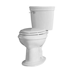 a white toilet sitting on top of a white floor