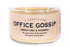 a candle that says office gossip smells like a scoundal on the inside of it