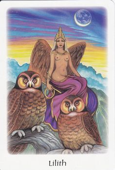 a tarot card with an image of two owls sitting on top of each other