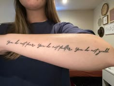 a woman with a tattoo on her arm that says, you can't do anything if