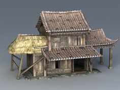 an old wooden house with a thatched roof