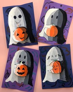 four halloween cards made to look like ghostes with pumpkins in their mouths and hands