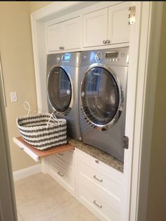 an image of a washer and dryer in a laundry room