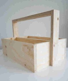 two unfinished wooden boxes sitting on top of a white surface with one open and the other closed