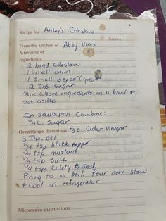 an old recipe book with writing on it