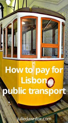 a yellow trolley car with the words how to pay for lisbon public transport