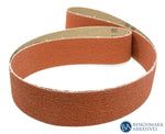 two sanding belts on white background