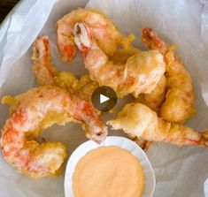 fried shrimp with dipping sauce on the side