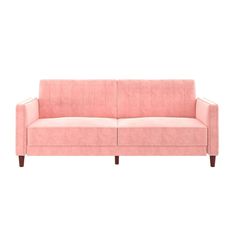 a pink couch sitting on top of a white floor