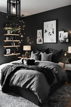 black and white bedroom with lights on the wall