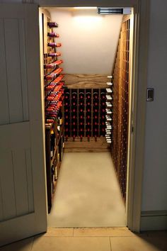 an open door leading to a wine cellar