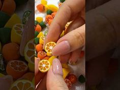 two pictures with oranges, lemons and cherries in the process of being decorated