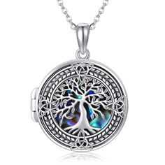 PRICES MAY VARY. 🌲 Design:Tree of life symbol of good luck,health,growth and strength.The tree of life locket inlay with abalone shell, mysterious, elegant and charming.A unique jewelry gifts to give someone you love. 🌲 Material :925 sterling silver celtic knot tree locket necklace with abalone shell, vintage,classic. Lead-Free & Nickel-Free, Hypoallergenic and safety for sensitive skin. 🌲 Size :Tree of Life photo locket pendant:0.78inch(20mm). Chain length: 18"+2 inch extension chain. packag Celtic Knot Tree, Vintage Locket Necklace, Shell Tree, Sterling Silver Locket Necklace, Locket Necklace Vintage, Silver Locket Necklace, Picture Locket, Sterling Silver Locket, Photo Locket Necklace