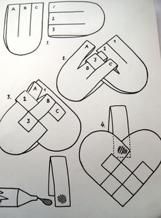 the instructions for making an origami heart with scissors and glue on paper sheet