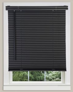 a window with black blinds in it