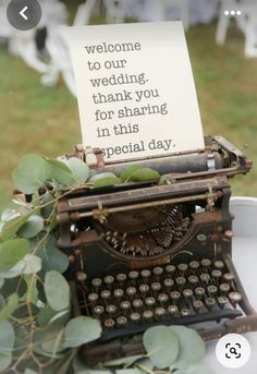 an old fashioned typewriter with a note attached to it