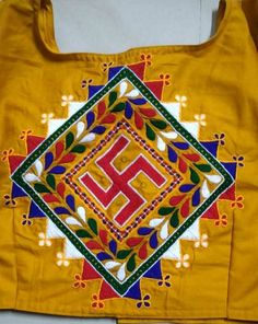 a yellow bag with colorful designs on it