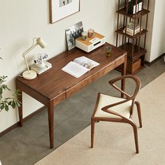 a wooden desk with a chair next to it