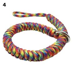 a multicolored rope bracelet with a metal clasp on the front and back of it